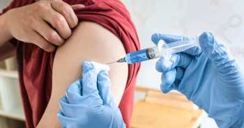 0_doctor-making-a-vaccination-into-patient-with-needle-getting-immune-vaccine-at-arm-for-flu-shot-cor_1621409759.jpg