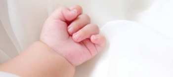 close-up-of-small-delicate-little-hand-of-newborn_45267-81.jpg